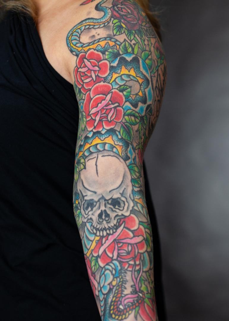 Colorful skull and snake sleeve tattoo by Matt Hodel, St. Louis by ragtime tattoo in south st louis on Morgan ford by tower grove park