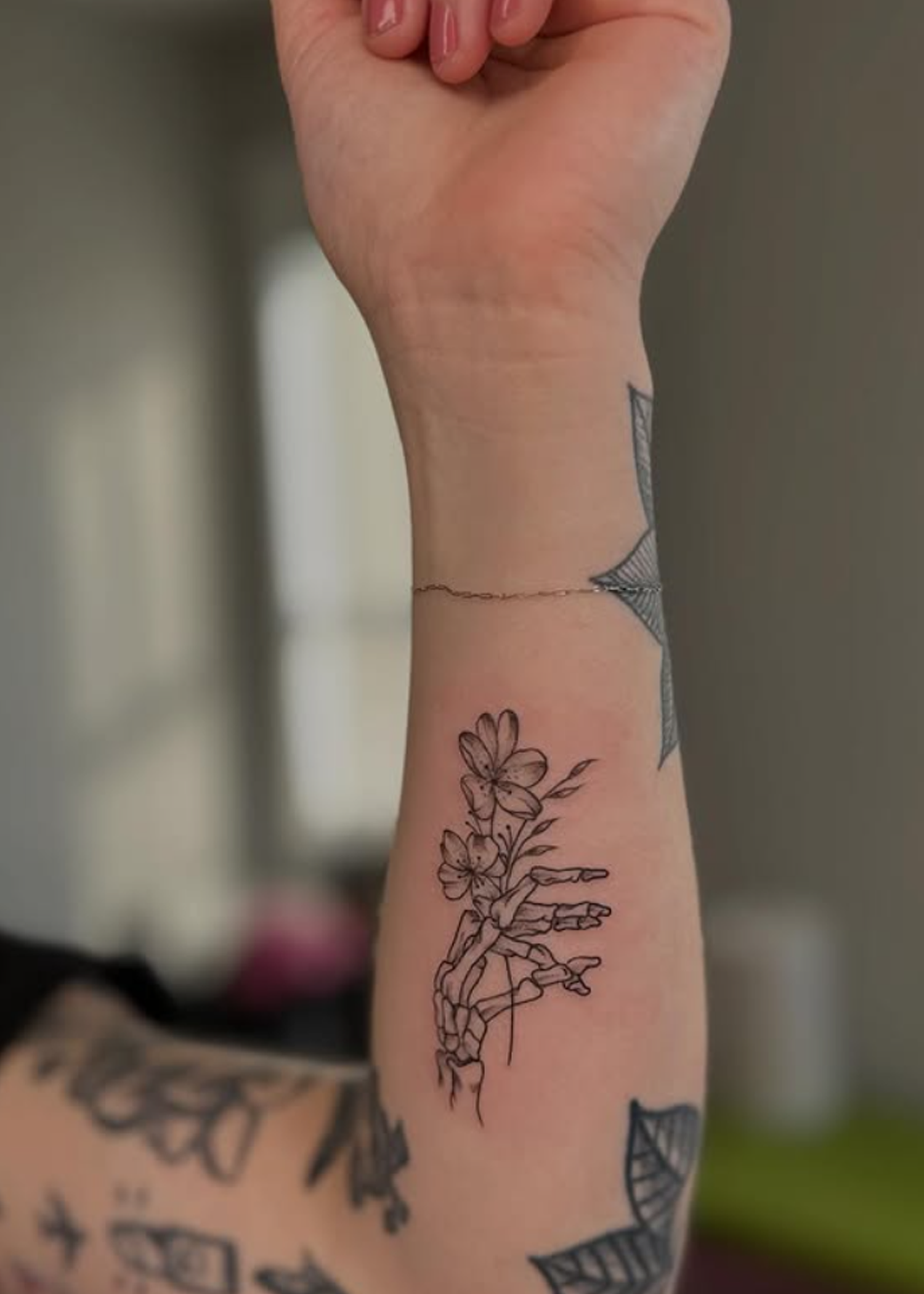 Grace Hanser is a fineline tattoo artist at Ragtime Tattoo Shop in South St. Louis, Missouri on Morganford