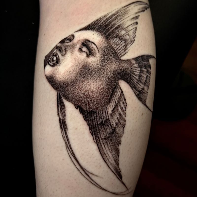 Surrealism Black and Grey Fish and Face Tattoo Done By Mads Shively at Ragtime Tattoo in St. Louis