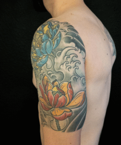 Floral sleeve tattoo by Ryan Henerey